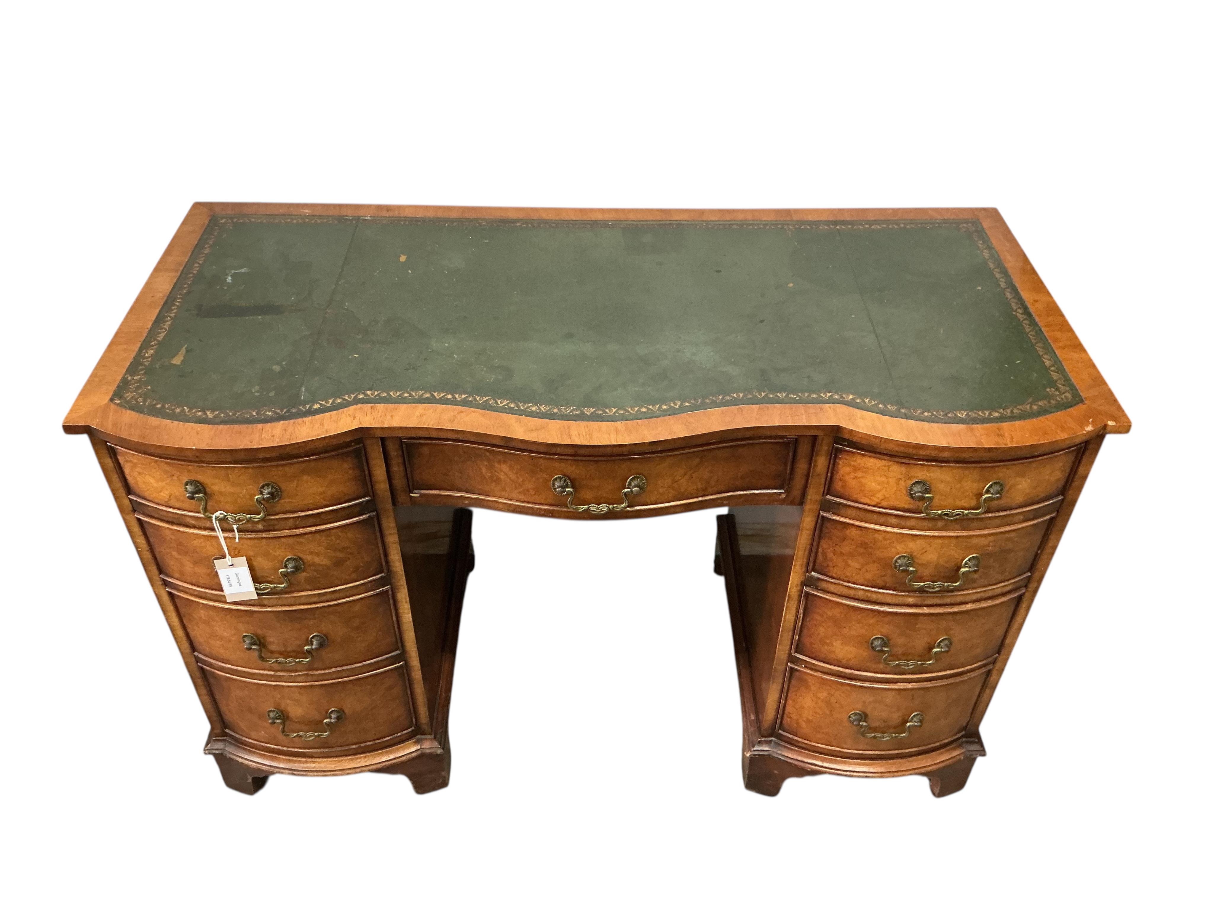 A reproduction burr walnut kneehole desk, width 115cm, depth 54cm, height 75cm